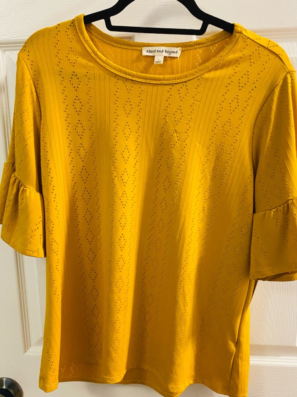 About and Beyond Mustard Eyelet Ruffle Sleeve Tee